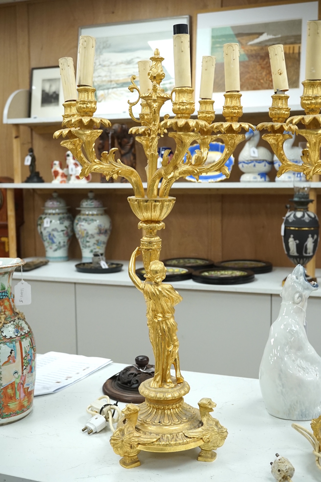 A pair of early 20th century French ormolu figural six branch table lamps, 74cm tall. Condition - good, not tested